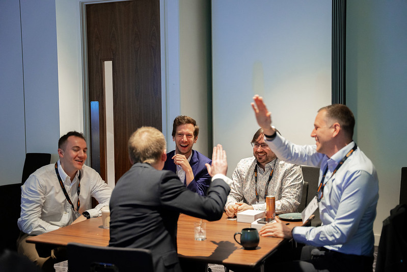 Relativity Fest London attendees high fiving