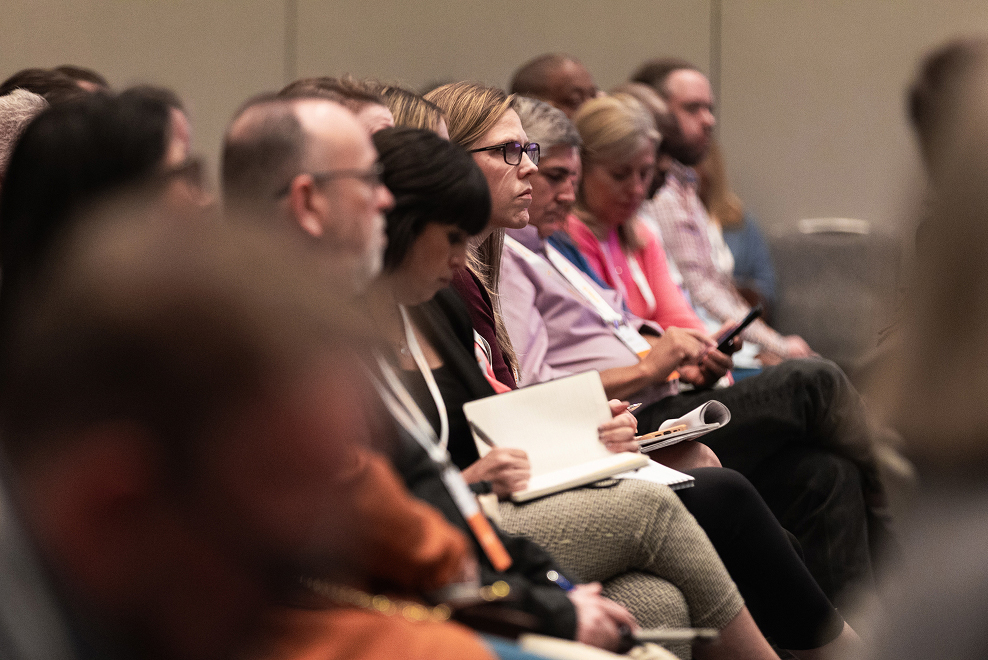 Relativity Fest attendees in sessions